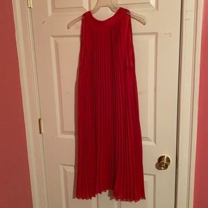 Red pleated lined sleeveless dress